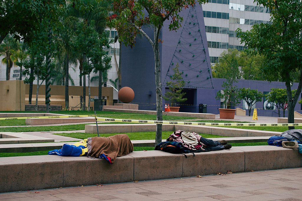 Homeless people sleeping in Pershing Square in Downtown Los Angeles