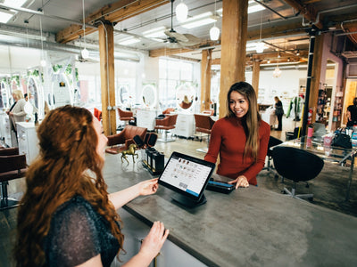 Employees talking at Makeup Counter