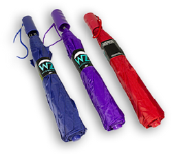 Three travel umbrellas on clear background