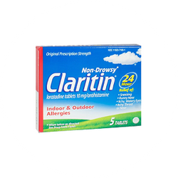 Box of Claritin allergy medication on a white background